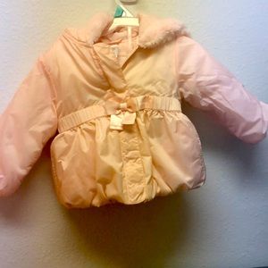 Gymboree 12-24 girls pink jacket with fur trim around hood.